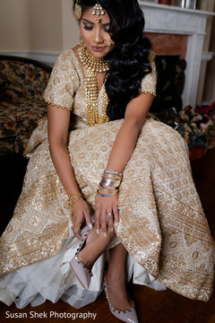 Maharani putting her shoes on. Maharani putting her shoes on.