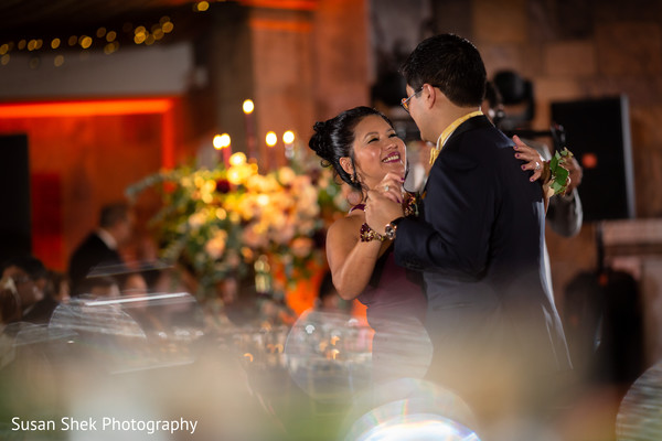 Indian groom dancing with his mother capture.