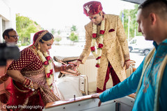 Indian bride getting in their just married car Indian bride getting in their just married car