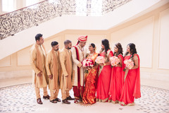 Indian groomsmen and bridesmaids with newlyweds Indian groomsmen and bridesmaids with newlyweds