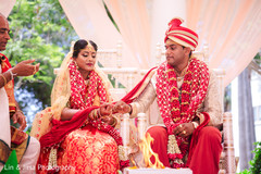 Indian bride and groom getting married Indian bride and groom getting married