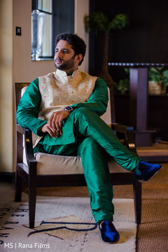 Indian groom wearing emerald green outfit Indian groom wearing emerald green outfit