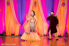 Indian bride and groom dancing Indian bride and groom dancing