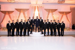 Groom and groomsmen posing during the reception Groom and groomsmen posing during the reception