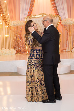Indian bride dancing with her father Indian bride dancing with her father