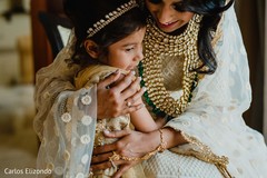 Indian bride hugging a special kid guest Indian bride hugging a special kid guest