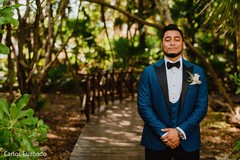 Indian groom wearing the tux Indian groom wearing the tux