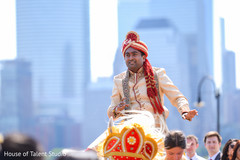 Indian groom riding baraat white horse. Indian groom riding baraat white horse.