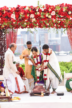 Indian couple making offerings to sacred fire. Indian couple making offerings to sacred fire.