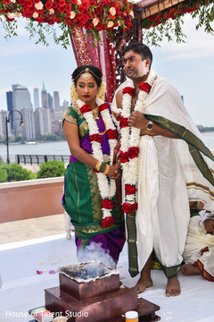 See this lovely Indian couple at ceremony rituals. See this lovely Indian couple at ceremony rituals.