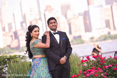 Joyful Indian bride and groom posing outdoors. Joyful Indian bride and groom posing outdoors.