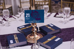 Indian wedding reception table numbers and favors. Indian wedding reception table numbers and favors.