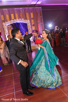 JoyfJoyful indian couple dance photo. JoyfJoyful indian couple dance photo.