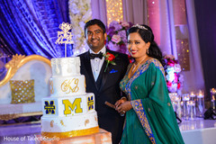 Indian wedding cake cutting fun moment Indian wedding cake cutting fun moment