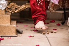 Indian groom stepping on nuts ritual. Indian groom stepping on nuts ritual.