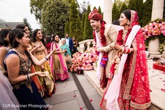 Indian groom negotiating with bridesmaids. Indian groom negotiating with bridesmaids.