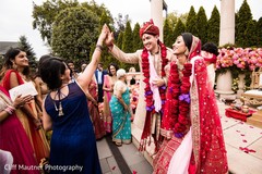 Indian bridesmaid and groom agree to get the mojaris cack. Indian bridesmaid and groom agree to get the mojaris cack.