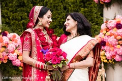 Indian bride with her mother at ceremony capture. Indian bride with her mother at ceremony capture.