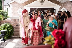 Indian bride throwing rice on her back. Indian bride throwing rice on her back.