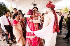 Indian bride saying goodbye to family. Indian bride saying goodbye to family.