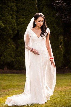 Astonishing Indian bridal on her white dress. Astonishing Indian bridal on her white dress.