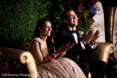 Joyful Indian couple at reception party. Joyful Indian couple at reception party.