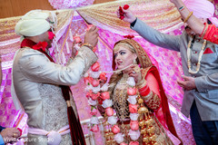 Indian bride and groom with the garlands Indian bride and groom with the garlands
