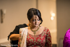 Indian bride being assisted by special guests Indian bride being assisted by special guests