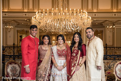 Indian bride posing with special guests Indian bride posing with special guests
