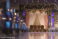 Beautiful floral arrangements over the mandap Beautiful floral arrangements over the mandap