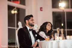 Indian groom and bride during the speeches Indian groom and bride during the speeches
