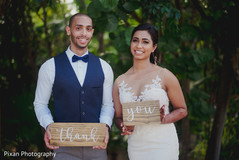 Lovely Indian couple with thank you signs. Lovely Indian couple with thank you signs.