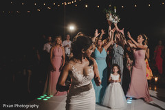 Indian bride throwing her bouquet capture. Indian bride throwing her bouquet capture.