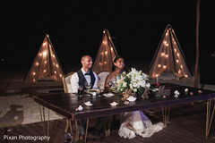 Lovely Indian couple at their wedding reception. Lovely Indian couple at their wedding reception.