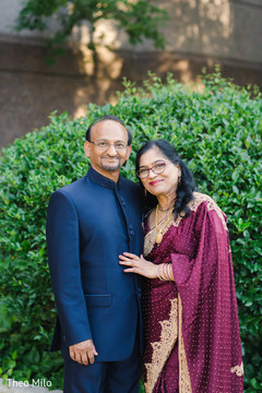 Parents posing for pictures Parents posing for pictures