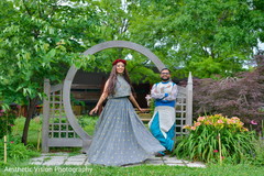 Indian bride and groom posing during the photo shoot Indian bride and groom posing during the photo shoot