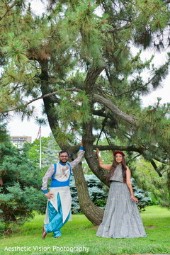 Indian bride and groom under a tree Indian bride and groom under a tree
