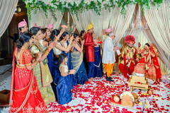 Indian bride and groom with guests Indian bride and groom with guests
