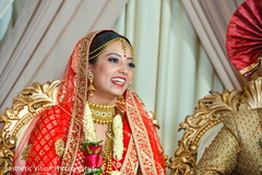 Indian bride smiling during the ceremony Indian bride smiling during the ceremony