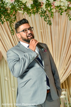 Indian wedding guest delivering a message Indian wedding guest delivering a message