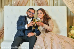 Indian groom and bride during toasts Indian groom and bride during toasts