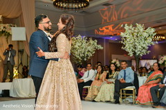 Indian bride and groom dancing Indian bride and groom dancing