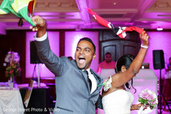 Indian newlyweds making their entrance to wedding reception Indian newlyweds making their entrance to wedding reception