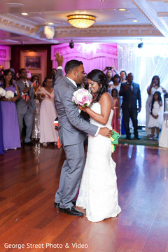 Adorable indian couple dancing during reception Adorable indian couple dancing during reception