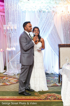 Enchanting indian groom saying words to bride Enchanting indian groom saying words to bride