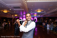 Indian groom enjoying their wedding reception Indian groom enjoying their wedding reception