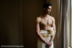 Indian groom getting ready for the ceremony Indian groom getting ready for the ceremony