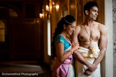 Indian bride and groom posing for pictures Indian bride and groom posing for pictures