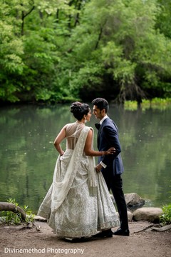 Lovely shot of the couple by the lake Lovely shot of the couple by the lake