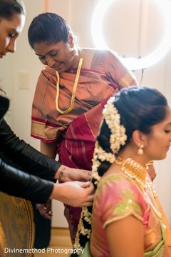 Maharani being assisted by hair and makeup artist Maharani being assisted by hair and makeup artist